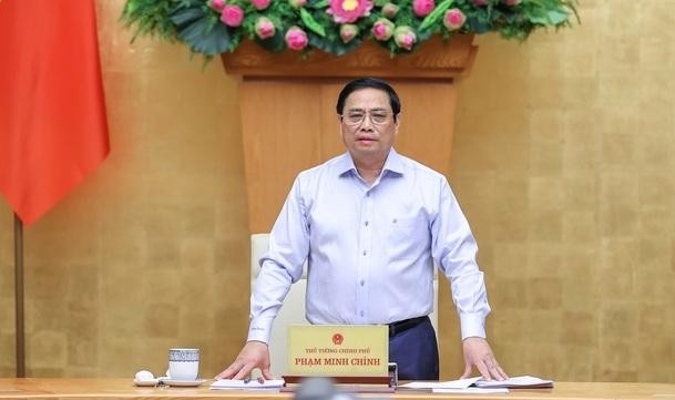 Thủ tướng Phạm Minh Chính chủ trì phiên họp Chính phủ thường kỳ tháng 7/2022, kết nối trực tuyến tới các địa phương. Ảnh VGP/Nhật Bắc