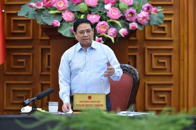Thủ tướng Phạm Minh Chính yêu cầu điều hành tỷ giá, lãi suất ổn định. Ảnh: VGP/Quang Thương.